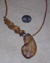 Carved Tiger Maple Pendant